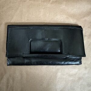 Vintage Rafy Black Leather Folding Clutch. 10” by 50 by 0.5”